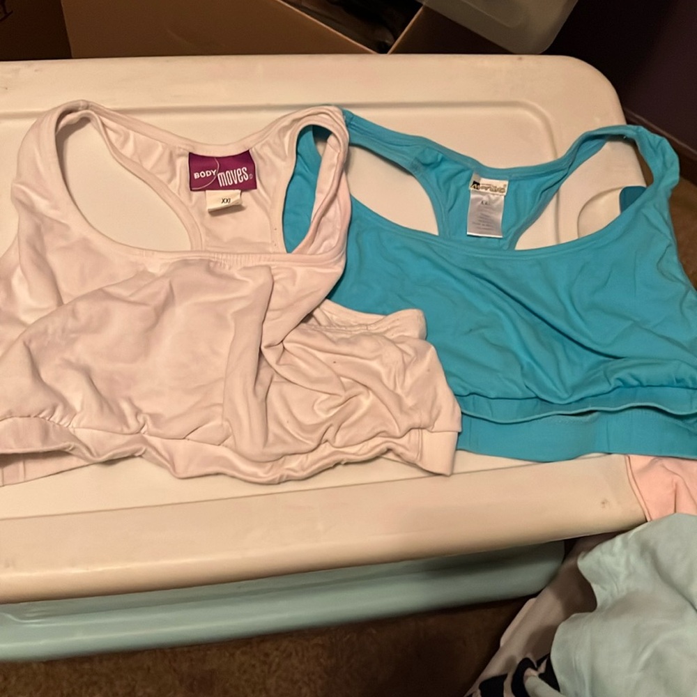 Set of two women’s size XXL sports bras/workout tops in good condition.